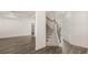 Inviting living room with staircase and hardwood floors at 1089 Blue Juniper Cir, Loganville, GA 30052