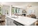 Open-concept kitchen and living room with seamless integration, perfect for entertaining and Gathering at 13574 Se Whitman Ln, Covington, GA 30014