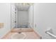 Simple half-bathroom with pink countertops, a mirror, a small sink, and basic fixtures at 1901 Cherwell Dr, Riverdale, GA 30296