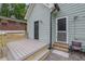 Backyard with new deck, stone patio and access doors to the house at 41 Spring Nw Ln, Atlanta, GA 30314