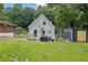 Backyard with a newly built deck, modern grill and a convenient storage shed at 41 Spring Nw Ln, Atlanta, GA 30314