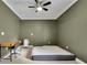 Spacious bedroom features neutral-colored walls, ceiling fan, and plush light-colored carpet at 41 Spring Nw Ln, Atlanta, GA 30314