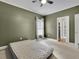 Bedroom with light-colored carpet, a walk-in closet, and a window with curtains at 41 Spring Nw Ln, Atlanta, GA 30314
