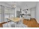 Bright and airy kitchen with white cabinets, stainless steel appliances, and butcher block island at 41 Spring Nw Ln, Atlanta, GA 30314