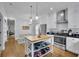Spacious kitchen with stainless appliances, bright dining area and hardwood floors at 41 Spring Nw Ln, Atlanta, GA 30314