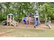 A colorful playground with slides, swings, and climbing structures offers fun for children at 6230 Lillie Ln, Cumming, GA 30040