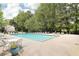 A beautiful community pool surrounded by lounge chairs, perfect for relaxation and recreation at 6230 Lillie Ln, Cumming, GA 30040