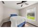Bedroom with natural light and neutral paint color at 135 Dunwick Ln, Mcdonough, GA 30253