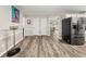 Elegant dining area seamlessly connects to kitchen with stainless steel appliances at 135 Dunwick Ln, Mcdonough, GA 30253