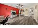 Bright living room with wood floors and a cozy fireplace at 135 Dunwick Ln, Mcdonough, GA 30253