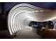 Illuminated sculptural archway in Westside Park at night, enhancing the walkway with light at 1670 Gunnin Nw Trce # 256, Atlanta, GA 30318
