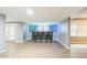 Finished basement with bar, space for seating, and walk-out access at 2260 Cobble Creek Ln, Grayson, GA 30017