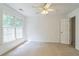 Bright bedroom with two large windows providing abundant light and a spacious closet at 2260 Cobble Creek Ln, Grayson, GA 30017