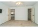 Spacious bedroom featuring two closets and access to the second floor at 2260 Cobble Creek Ln, Grayson, GA 30017