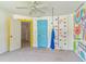 bedroom with climbing wall, hardwood door, with rainbow accents at 2260 Cobble Creek Ln, Grayson, GA 30017