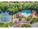 Community amenities include a sparkling pool, playground, and tennis courts surrounded by lush greenery at 4096 Vinings Mill Se Trl, Smyrna, GA 30080