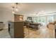 Basement featuring a wet bar and open living area with doors to the outside at 4096 Vinings Mill Se Trl, Smyrna, GA 30080