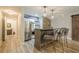 Finished basement bar with stainless steel appliances and wood paneling detail at 4096 Vinings Mill Se Trl, Smyrna, GA 30080