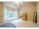 Bedroom featuring neutral paint, window seat, and vaulted ceilings at 4096 Vinings Mill Se Trl, Smyrna, GA 30080