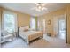 Cozy bedroom with large windows, natural light and ceiling fan at 4096 Vinings Mill Se Trl, Smyrna, GA 30080