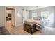 Bedroom with wood floors, natural light, and sliding closet door at 4096 Vinings Mill Se Trl, Smyrna, GA 30080