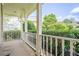 Cozy front porch featuring classic white railings, offering a welcoming outdoor space at 4096 Vinings Mill Se Trl, Smyrna, GA 30080