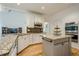 Well-equipped kitchen boasting granite countertops, stainless steel appliances, an island, and ample cabinet space at 4096 Vinings Mill Se Trl, Smyrna, GA 30080