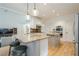 Modern kitchen with stainless steel appliances, a granite island, and an open layout at 4096 Vinings Mill Se Trl, Smyrna, GA 30080