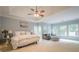 Light filled main bedroom with tray ceiling and large windows at 4096 Vinings Mill Se Trl, Smyrna, GA 30080
