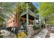 Two story brick building featuring antique millinery goods and a covered outdoor balcony at 219 Poplar Nw St, Lilburn, GA 30047