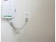 Rain Bird controller installed on the wall for efficient watering, adding convenience to lawn maintenance at 219 Poplar Nw St, Lilburn, GA 30047