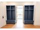 Mud room features built-in blue storage cubbies at 219 Poplar Nw St, Lilburn, GA 30047