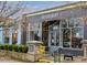 Charming restaurant exterior in historic Old Town Lilburn with inviting storefront and ample outdoor seating at 219 Poplar Nw St, Lilburn, GA 30047
