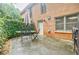 Cozy patio area outside the brick house, perfect for outdoor relaxing at 3030 Spalding Dr, Sandy Springs, GA 30350