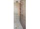 Modern tiled shower with multiple shower heads and a built-in shelf at 3030 Spalding Dr, Sandy Springs, GA 30350