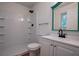 Bathroom featuring shower/tub, vanity and new mirror with designer accent at 5640 Redan Cir, Stone Mountain, GA 30088