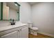 Bathroom featuring vanity with sink and a new toilet at 5640 Redan Cir, Stone Mountain, GA 30088