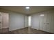 This bedroom has hardwood floors, and a closet with double doors at 5640 Redan Cir, Stone Mountain, GA 30088