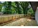 View of the wood deck with railing and natural view at 5640 Redan Cir, Stone Mountain, GA 30088