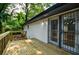 Deck with ornate metal security door to the house at 5640 Redan Cir, Stone Mountain, GA 30088