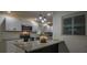 Updated kitchen with an island, stainless steel appliances and granite countertops at 5640 Redan Cir, Stone Mountain, GA 30088
