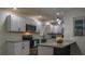 Renovated kitchen with stainless steel appliances, granite countertops and subway tile backsplash at 5640 Redan Cir, Stone Mountain, GA 30088