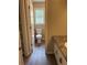 Bathroom with a toilet, closet and a vanity with a hard surface countertop at 6103 Chaseland Dr, Rex, GA 30273