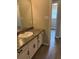Bathroom vanity with white cabinets and hard surface countertop at 6103 Chaseland Dr, Rex, GA 30273