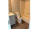 Bathroom boasts neutral tones, tub with shower, and updated vanity, creating a soothing and functional space at 6103 Chaseland Dr, Rex, GA 30273