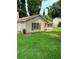 This single-story home has vinyl siding, a cozy yard, and lots of potential at 6103 Chaseland Dr, Rex, GA 30273