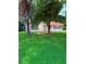 Charming single-story home with lush lawn and mature trees in a serene setting at 6103 Chaseland Dr, Rex, GA 30273