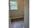 Laundry room with window, utility connection and painted walls at 6103 Chaseland Dr, Rex, GA 30273