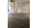 Spacious living room with hardwood floors and neutral wall paint at 6103 Chaseland Dr, Rex, GA 30273