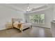 Bright primary bedroom features tray ceiling, large window, and neutral decor for a tranquil retreat at 783 Phil Haven Ln, Kennesaw, GA 30152
